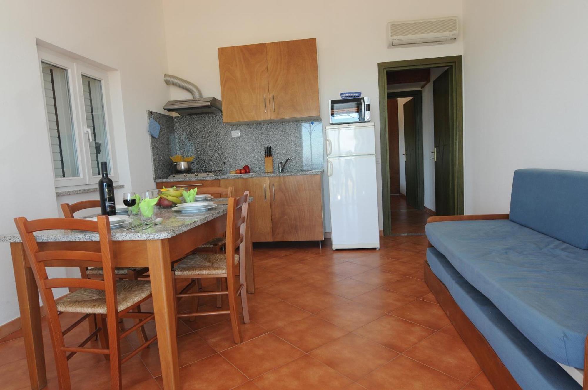 Gf Apartments Li Seddi Badesi Exterior foto
